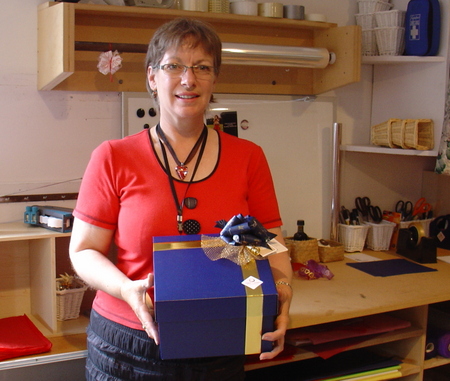 Kat Rutledge with Corporate Gift box